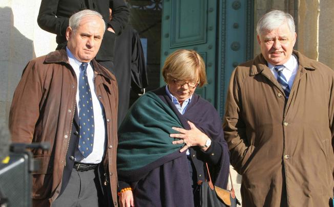Christine de Vedrines (centre) and Philippe de Vedrines (right) as they leave the Bordeaux court on Tuesday. Photo: AFP
