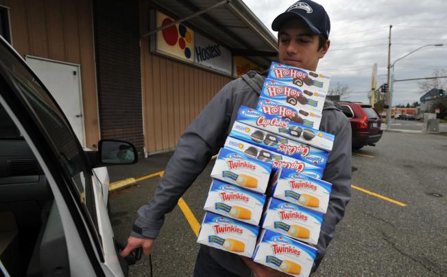 A man hoards Twinkies after Hostess said it was closing. Photo: MCT