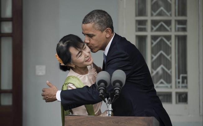 US President Barack Obama embraces Aung San Suu Kyi at her residence in Yangon. Photo: AFP