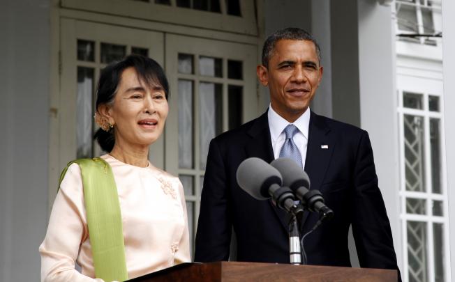 President Barack Obama with fellow Nobel Peace Prize laureate Aung San Suu Kyi at the home where she had long been under house arrest. Photo: Xinhua