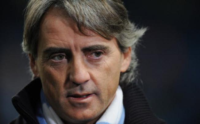 Manchester City manager Roberto Mancini. Photo: EPA