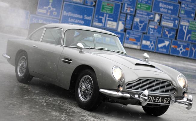 The 1964 Aston Martin DB5, made famous in the James Bond movies <i>Goldfinger</i> and <i>Thunderball</i>, is displayed after restoration in Luzern. Photo: Reuters