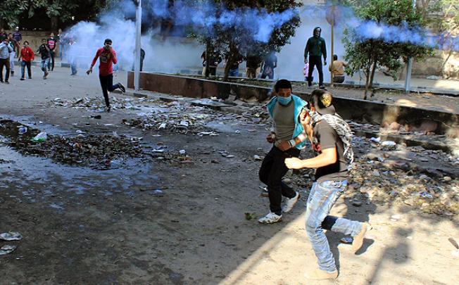 Egyptian protesters clash with police in Tahrir Square in Cairo. Photo: EPA