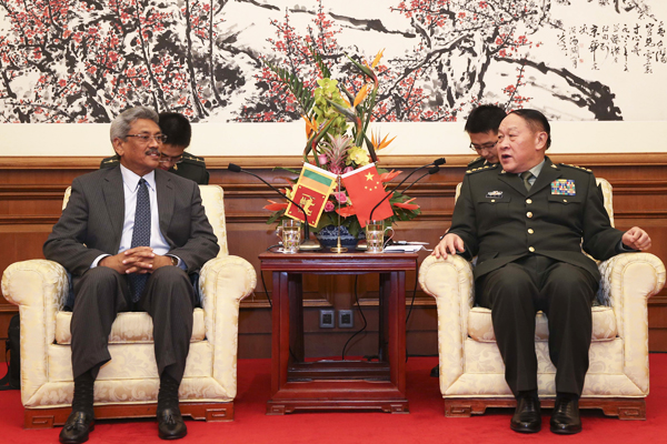 Chinese Defence Minister Liang Guanglie (right) meets with Sri Lankan Secretary of Defence and Urban Development Ministry Gotabaya Rajapaksa in Beijing on November 11. Photo: Xinhua