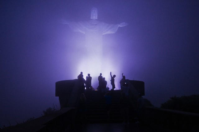 Rio's Christ the Redeemer statue by night. Photos: Corbis, Daniel Pinheiro, Marcio Scavone, Tuca Reines