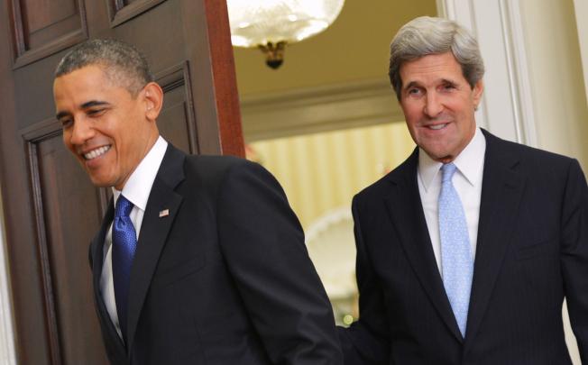 US President Barack Obama (left) and Senator John Kerry. Photo: AFP