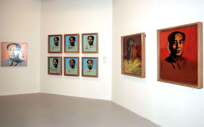 Andy Warhol's paintings of Mao Zedong, now showing in Hong Kong, are to be excluded from the exhibition in Shanghai and Beijing. Photo: AFP