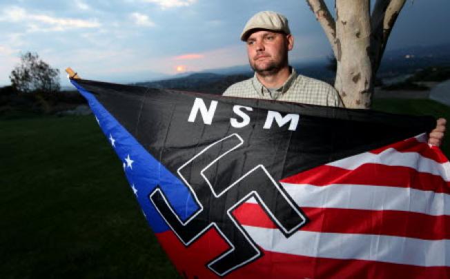 Jeffrey Hall with a Nazi flag. Photo: AP