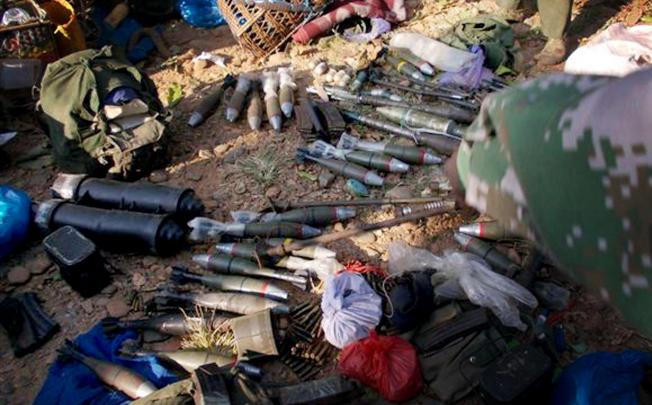 Kachin rebels display the ammunitions they seized from Myanmar soldiers in Laiza, northern Myanmar, last month. Photo: AP