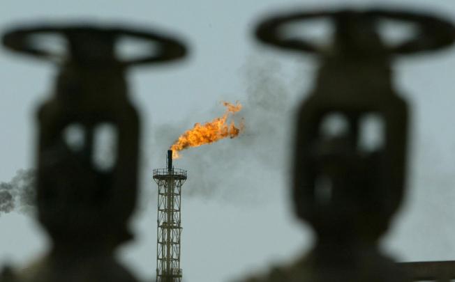 Oil firm forecasts that 70 per cent of global emissions will be from developing countries, and that China will depend on imports as the US becomes self-sufficient. Photo: Reuters