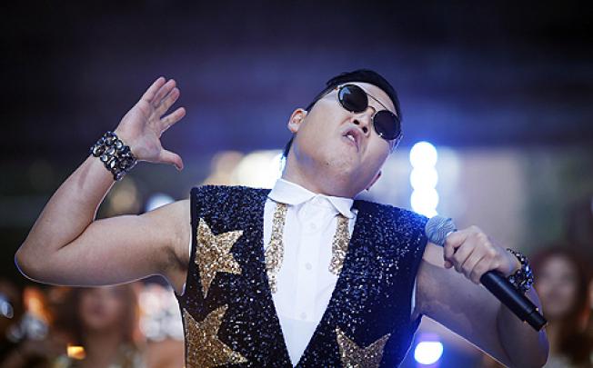 South Korean rapper Psy performs his hit "Gangnam Style", which became the first video to break a billion views on YouTube. Photo: Reuters