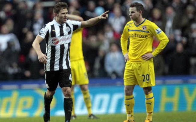 Newcastle United's French midfielder Yohan Cabaye (left). Photo: AFP