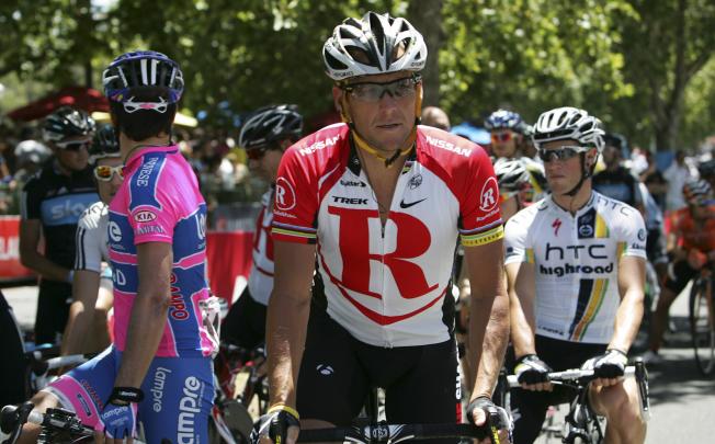 Lance Armstrong competes in the Tour Down Under cycling event in Adelaide, Australia, in 2001. The Australian Crime Commission's findings has "clear parallels" with Armstrong's doping case. Photo: AP 