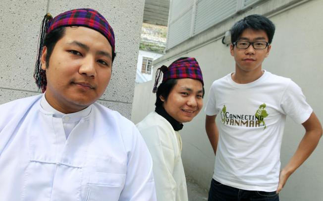 Htoi Awng (left) and Mung Don with volunteer Edward Tsoi Mang-hin.