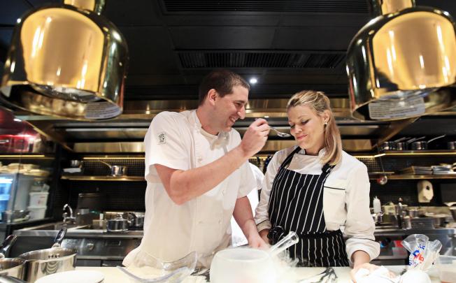 Serge Theriault (left) met girlfriend Andrea Ford working in a restaurant, and now the two of them cook together on Valentine's Day. Photo: Jonathan Wong