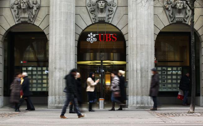 UBS fined over AIG investment fund risks. Photo: Reuters