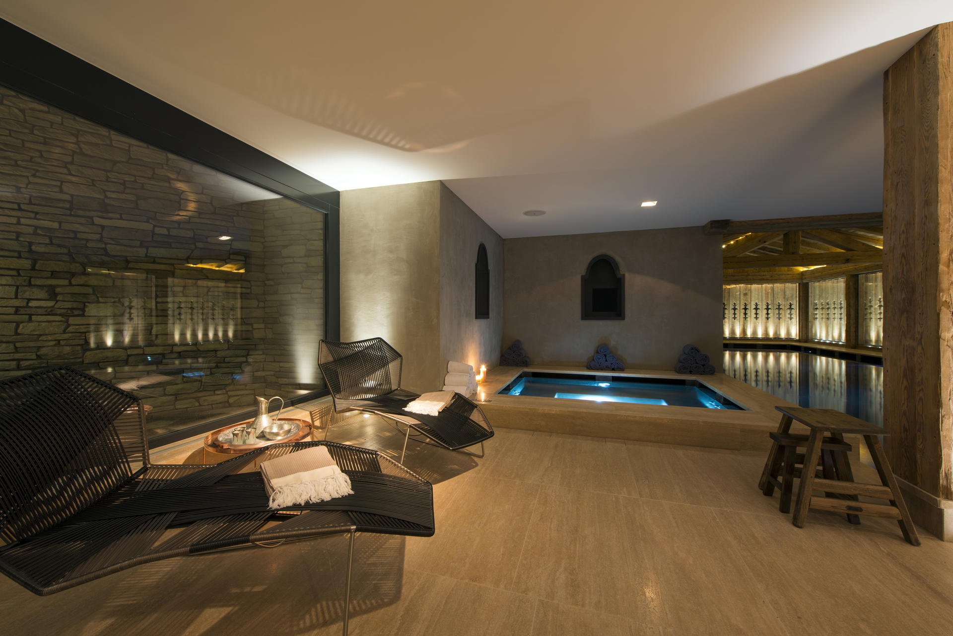 The spa at the Cordee des Alpes (above); rooms and suites feature open fireplaces and balconies (below).Photos: Yves Garneau