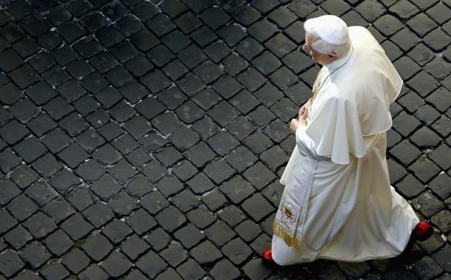 Pope Benedict XVI walking at the Vatican. Photo: Reuters