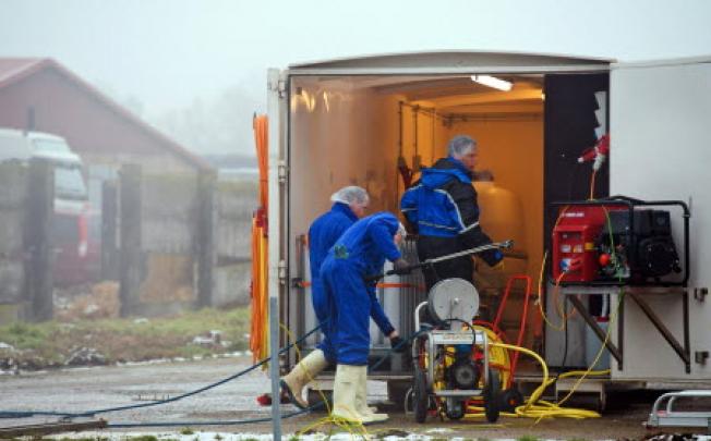 Desinfection equipment being prepared on Saturday at a company near Seelow, Brandenburg state, Germany, where ducks have been diganosed with bird flu. Photo: EPA