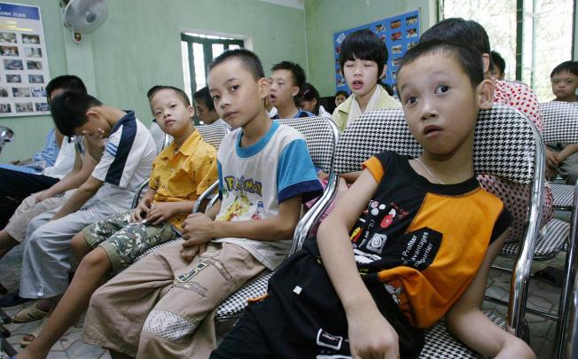 Child victims of Agent Orange are taught vocational skills at Friendship Village. Photo: AFP