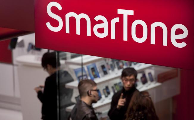 SmarTone reported a 'significant' reduction in international mobile roaming traffic, which saw net profits drop 3pc. Photo: Bloomberg