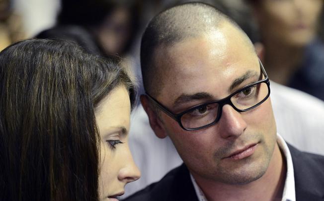 Oscar Pistorius older brother Carl (right) and sister Aimee. Photo: AFP