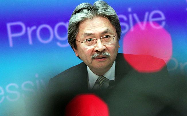 Financial Secretary John Tsang attends a news conference after delivering his budget speech at Central Government Office, Tamar. Photo: David Wong 