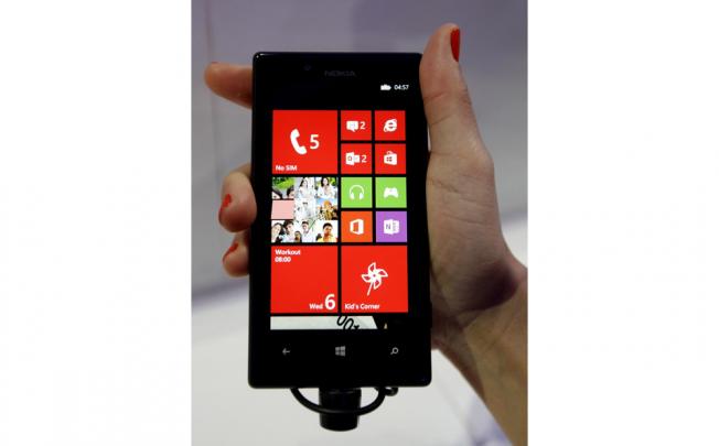 Nokia's newest Lumia smartphones run on Microsoft's operating system and come with Excel, Word and PowerPoint. Photo: Reuters