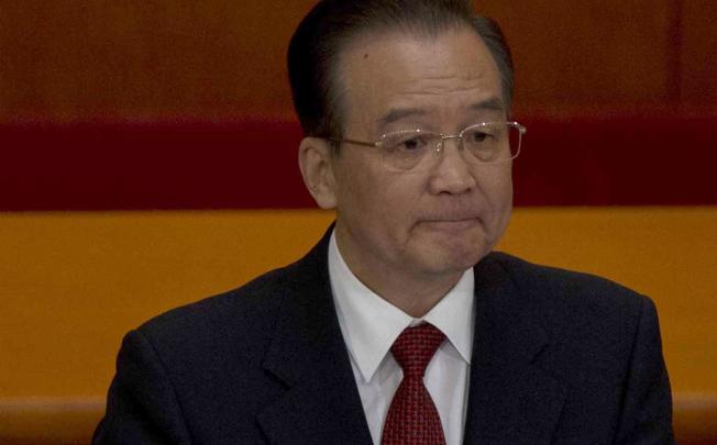 Chinese Premier Wen Jiabao delivers the work report at the opening session of the annual National People's Congress in Beijing. Photo: AP