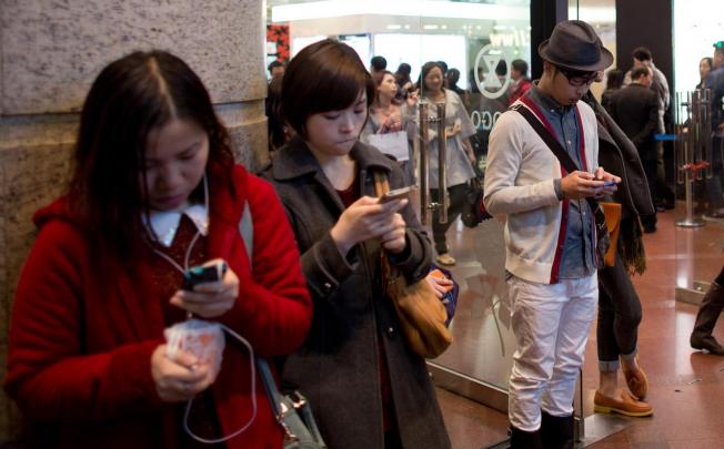 The city's big mobile network operators have warned of increased service degradation if they lose part of their 3G spectrum. Photo: Bloomberg