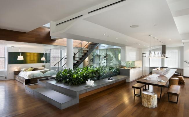 This penthouse loft in Manhattan's Nolita section has a central light well and a garden, designed by Joel Sanders. Photo: Joel Sanders Architect