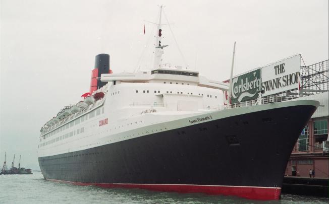 The QE2 in its heyday, docked at the Ocean Terminal in Hong Kong in 1994. Its maiden voyage, from Southampton to New York in May 1969, took five days. Photo: SCMP