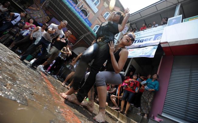 Gay Yangon residents celebrate during the first day of the Thingyan water festival in April of 2011. Photo: AFP