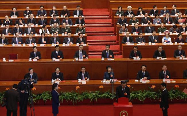 New Premier Li Keqiang unveils his new cabinet team as the National People's Congress plenary approaches its conclusion.