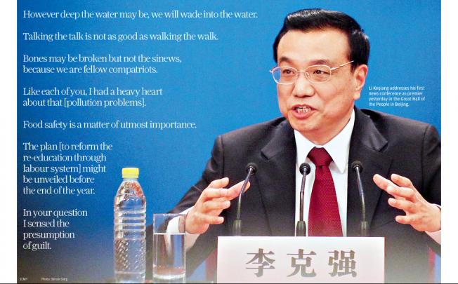 Li Keqiang addresses his first news conference as premier yesterday in the Great Hall of the People in Beijing. Photo: Simon Song