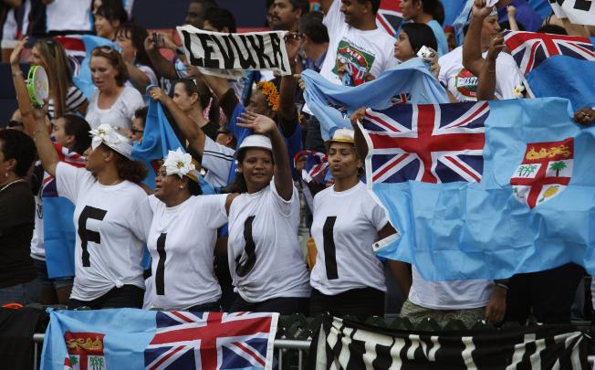 Fiji fans cheer before the start of a preliminary match between Fiji and Hong Kong during the Hong Kong Sevens rugby tournament in Hong Kong. Photo: Reuters