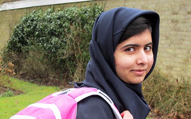 Malala Yousafzai attends her first day of school on March 19 just weeks after being released from hospital. Photo: AP