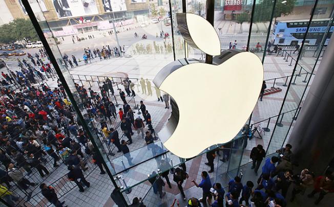 Apple opens its' largest store in Asia in the tourist shopping area of Wangfujing in Beijing. Photo: EPA