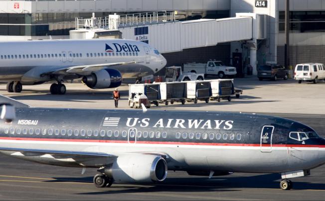 Airlines such as US Airways and Delta are rated higher on average by analysts than 92 per cent of US companies. Photo: Bloomberg