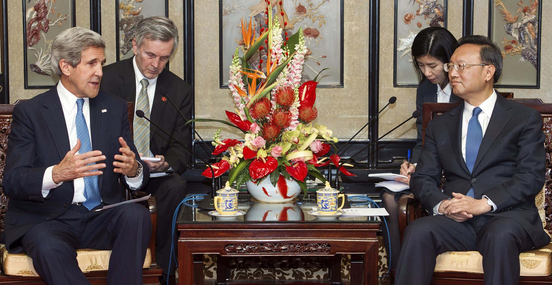 US Secretary of State John Kerry speaks with State Councillor Yang Jiechi during their meeting in Beijing on Saturday. The next high-level meeting will be in July. Photo: AP