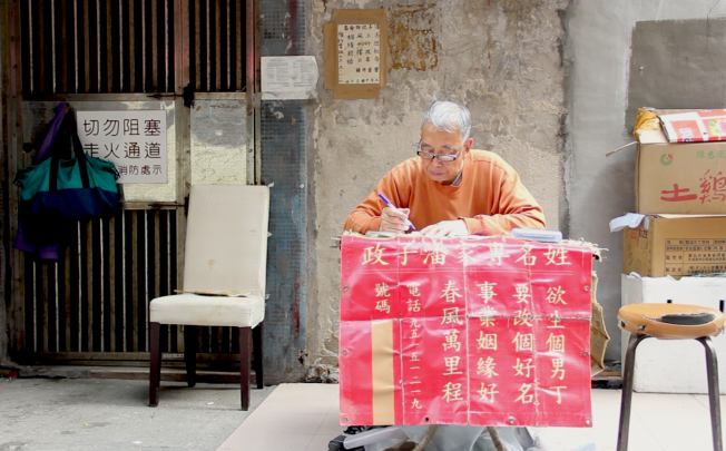 Pun Tse-ching writes letters for people in his neighbourhood. 