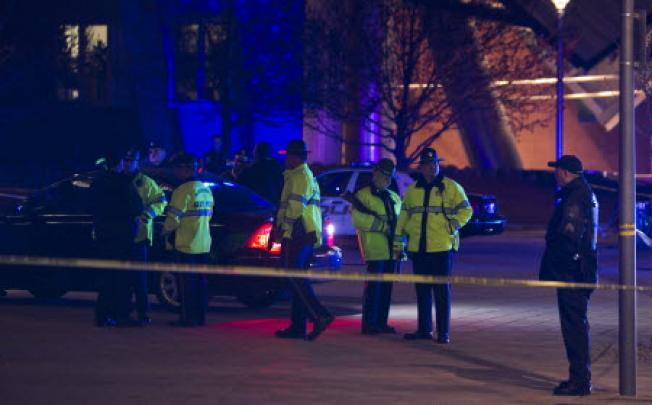  Massachusetts State Police and MIT police search at the scene of the shooting of a Massachusetts Institute of Technology police officer in Cambridge, Massachusetts. Photo: EPA
