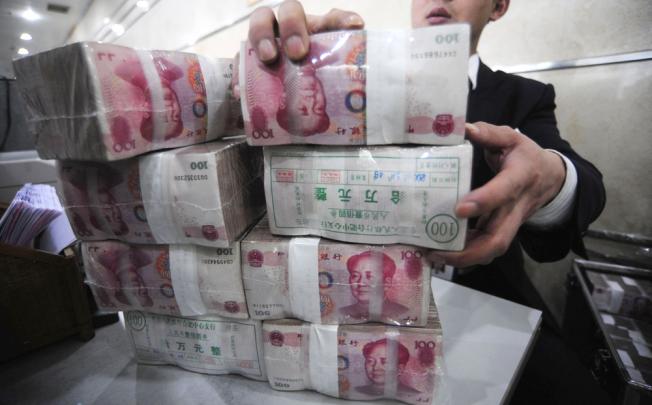 Renminbi trade settlement is growing, hitting 15 per cent of China's overall trade in the first two months of this year, up from 12 per cent in 2012. Photo: Reuters