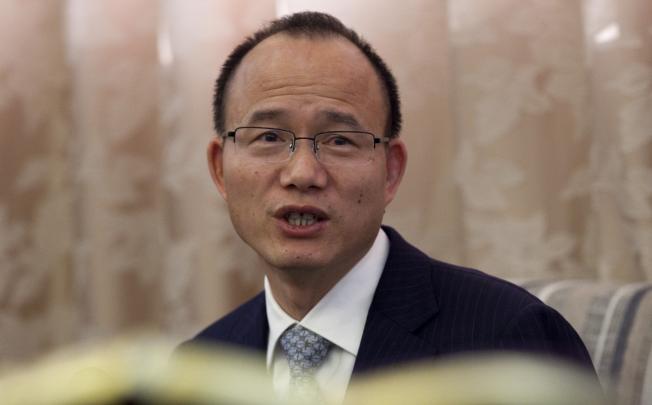 Guo Guangchang, chairman of Fosun International. Fosun has won a court order on the mainland forcing the developer Soho China to return to the vendors the 50 per cent stake it bought in a project in Shanghai. Photo: Bloomberg