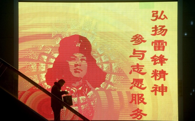 Humble soldier Lei Feng became a household name and China's symbol of sacrifice for others after his death in 1962. Photo: EPA