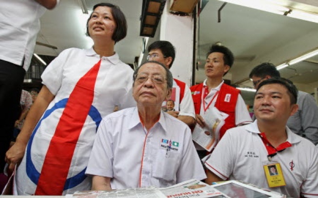 Malaysia's opposition Democratic Action Party (DAP) adviser Lim Kit Siang (centre) surrounded by supporters in Kuala Lumpur. Photo: EPA