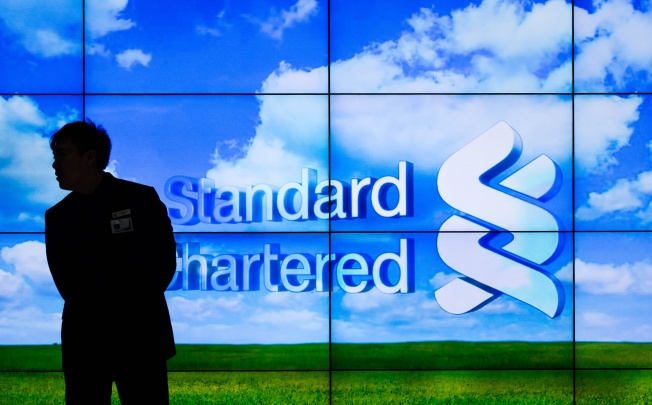 First-quarter operating profit fell slightly from the previous year, Standard Chartered said yesterday. Photo: AFP