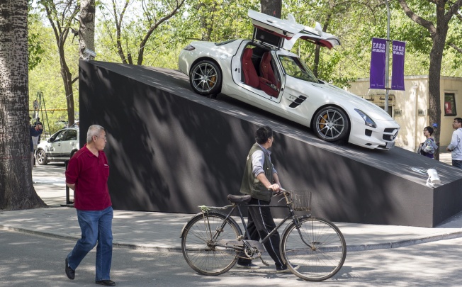 It’s nice, but is it art? A Mercedes AMG SLS sport car on display at the Art Beijing Expo earlier this month. Foreign car brands in China have a cachet that local companies have failed to match. Photo: EPA