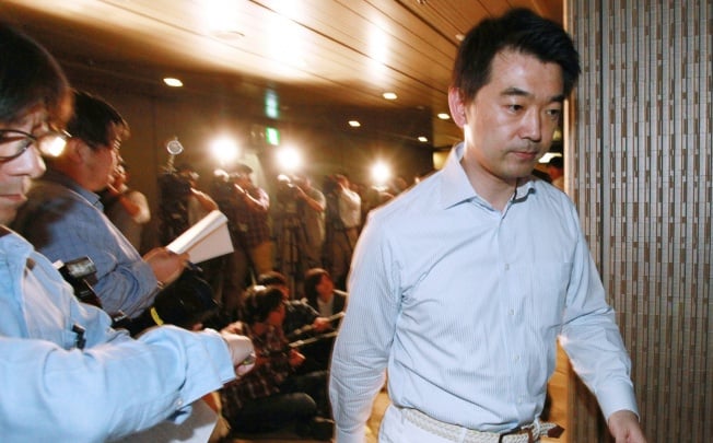 Osaka Mayor and Japan Restoration Party co-leader Toru Hashimoto leaves a press conference at Osaka city hall in Osaka. Photo: AFP