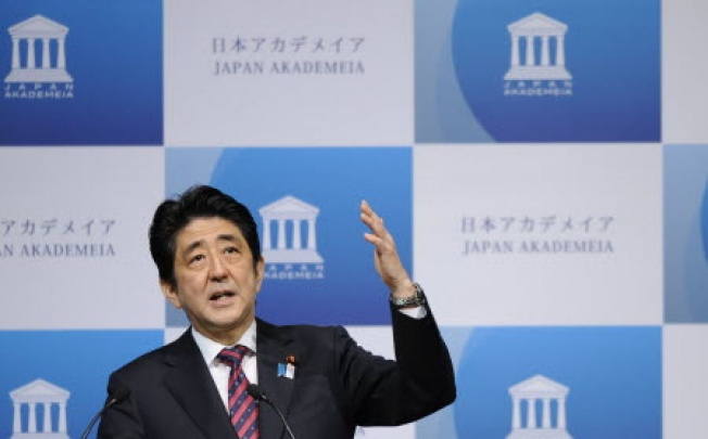 Japan's Prime Minister Shinzo Abe delivers a speech during a reception in Tokyo. Photo: Xinhua